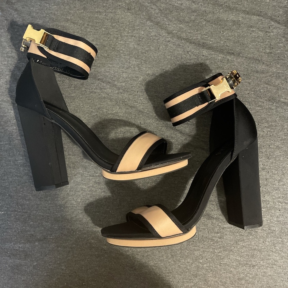 Black and nude pumps